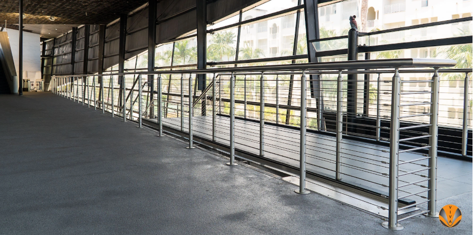 An image of a stainless steel railing system at a Publix.