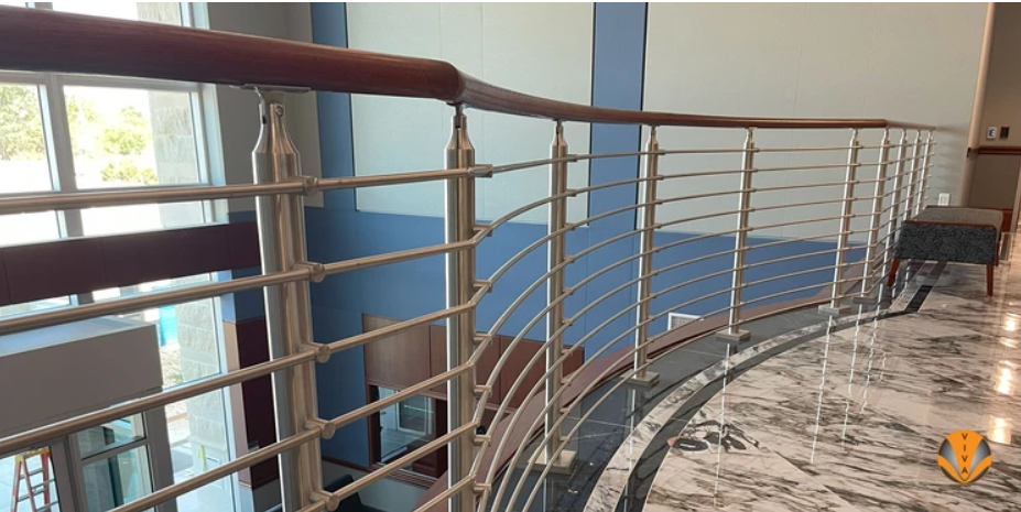 An image of a modern metal railing system mixed with wood.