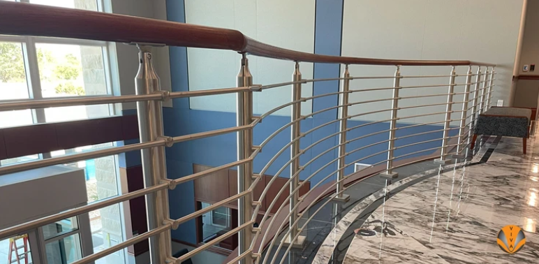 The Playa Vista Runway features dining, fitness, shops, urgent care, and a multi-colored SOLO™ Glass Railing System.