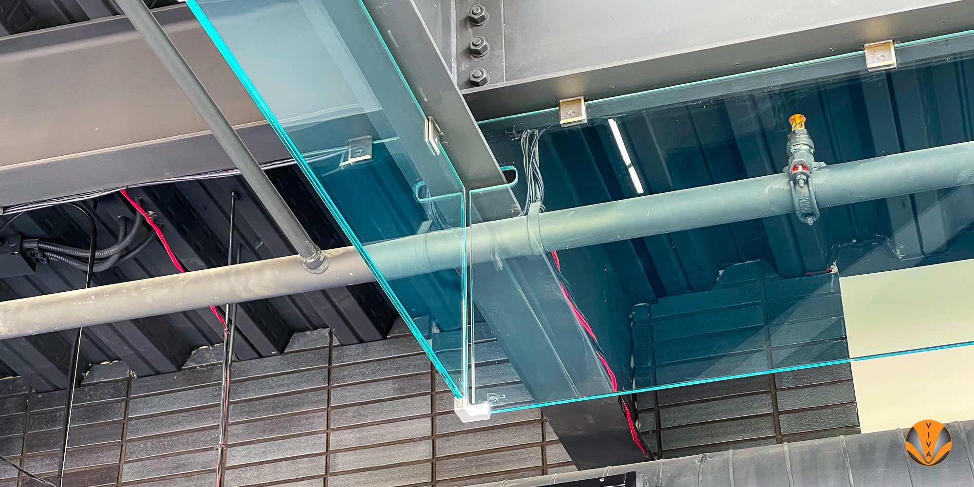 Smoking Railing Smoke Barrier System & VIEW™ Button Glass - Core… | VIVA Railings
