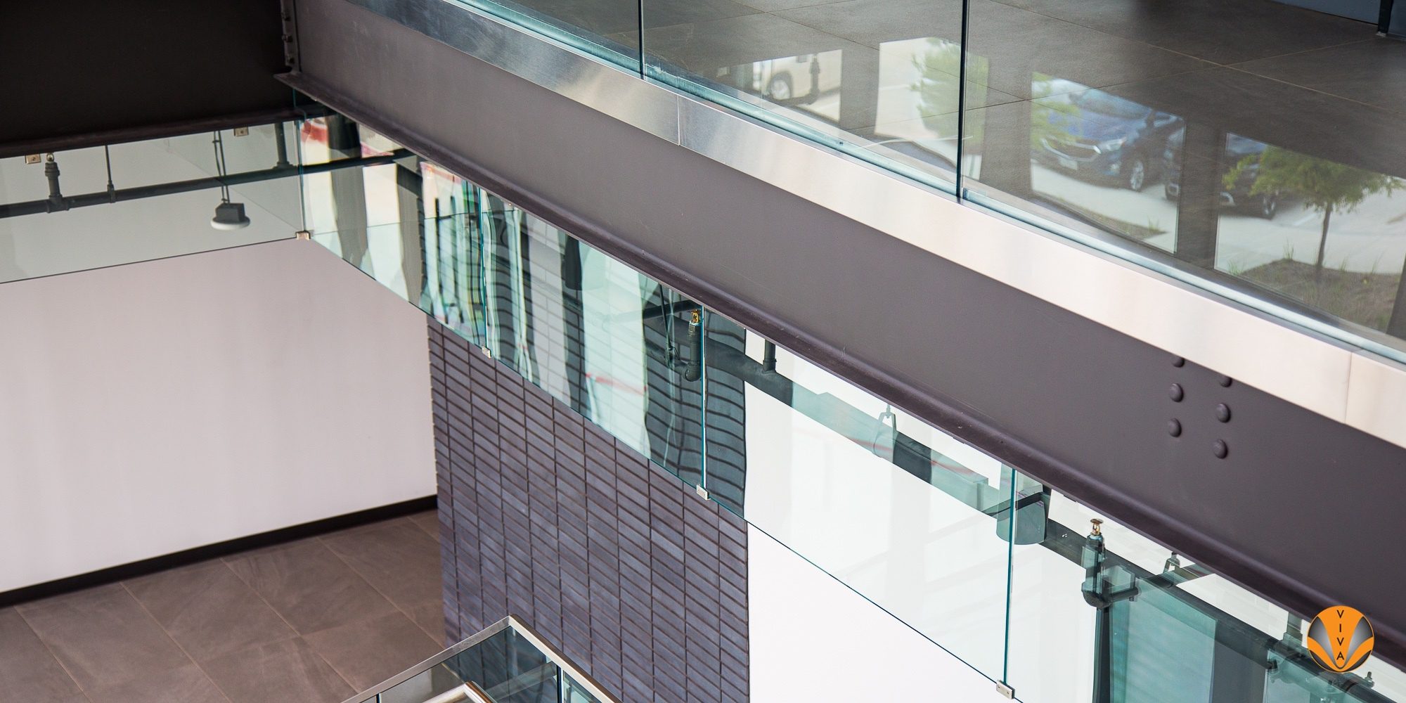 Smoking Railing Smoke Barrier System & VIEW™ Button Glass - Core… | VIVA Railings