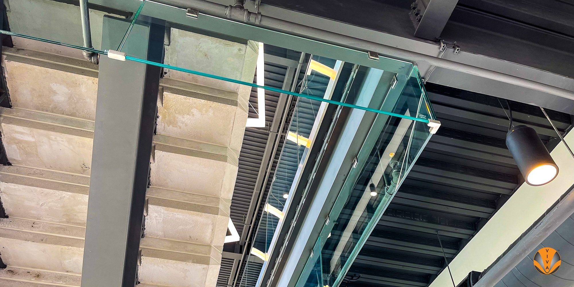 Smoking Railing Smoke Barrier System & VIEW™ Button Glass - Core… | VIVA Railings